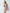 Aurora Beige One-Shoulder Feather Sleeve Mini Dress