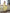 Adriana Yellow Off-Shoulder Draped-Bow Midi Dress